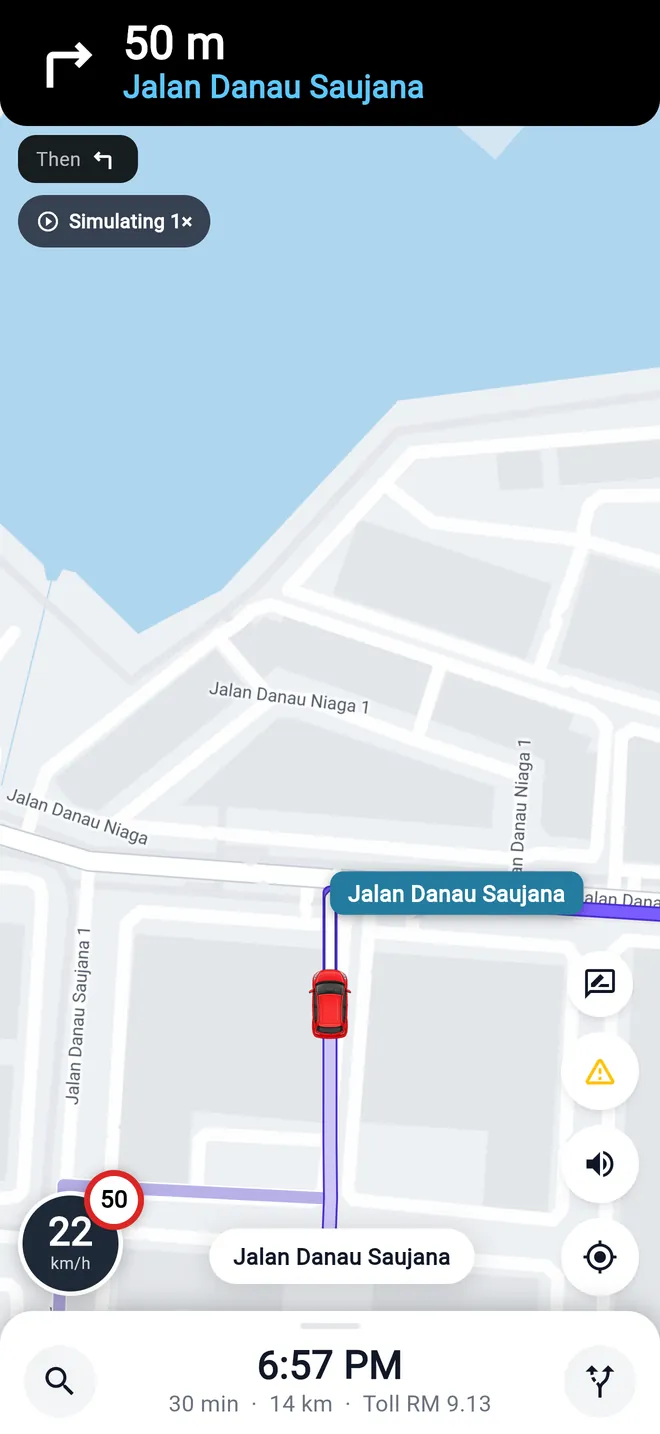 Pandu turn-by-turn navigation screen with the next turn on Jalan Danau Saujana
